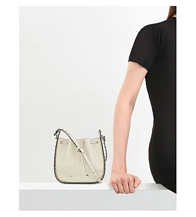 Shop Valentino Rockstud Leather Bucket Bag In Ivory