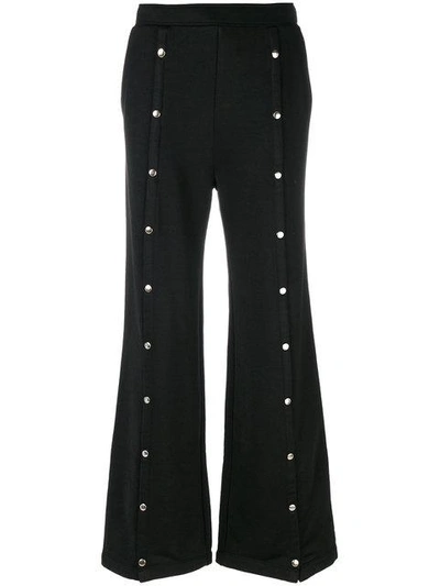 studded flared trousers