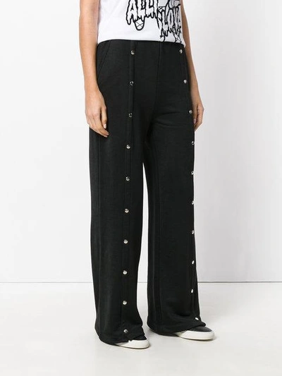 Shop Alexander Wang T Studded Flared Trousers In Black