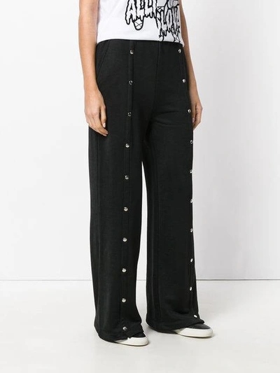 studded flared trousers