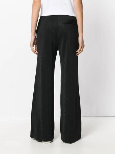 Shop Alexander Wang T Studded Flared Trousers In Black