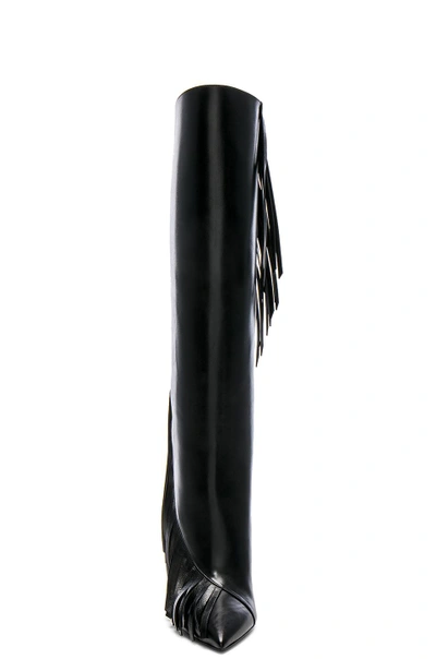 Shop Saint Laurent Niki Fringe Leather Boots In Black