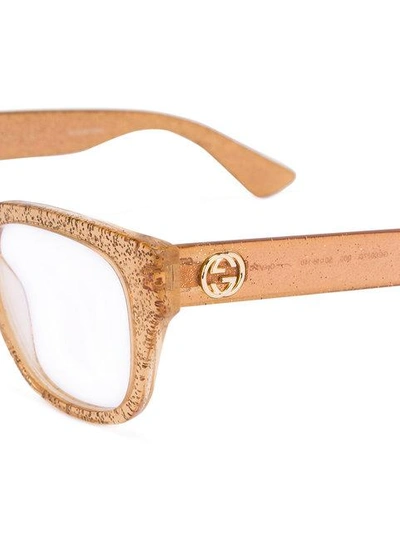 Shop Gucci Transparent Glitter Square Glasses