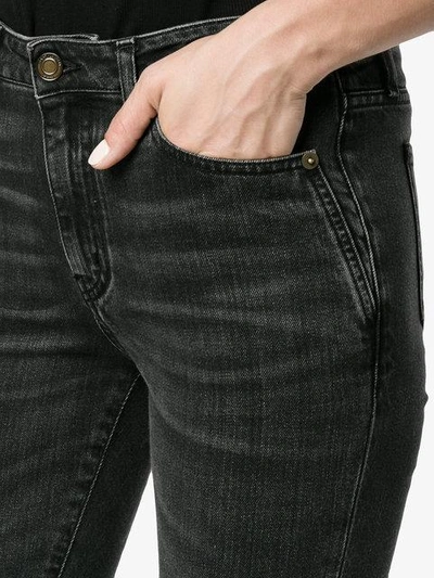 Shop Saint Laurent Washed Black Mid Rise Skinny Jeans