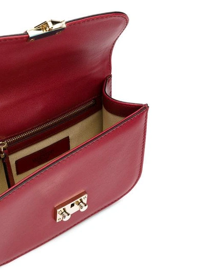 Shop Valentino Garavani Glam Lock Shoulder Bag - Red