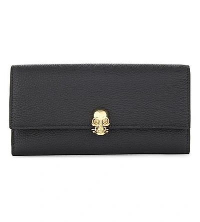 Shop Alexander Mcqueen Continental Leather Skull Wallet In Black Gold
