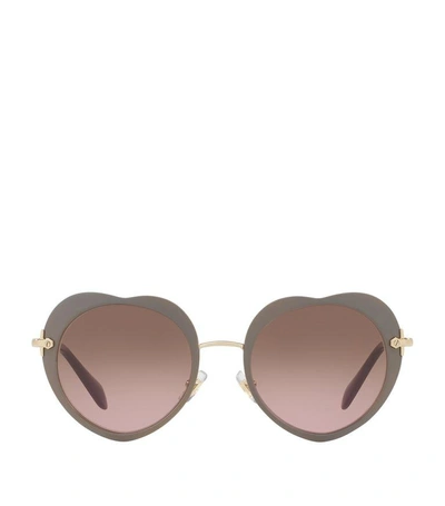 Shop Miu Miu Heart Shape Sunglasses In Beige