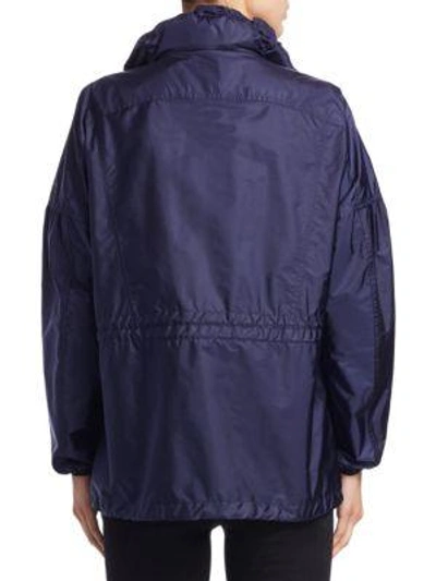 Shop Burberry Front Zip Raincoat In Sheen Detail In Bright Navy