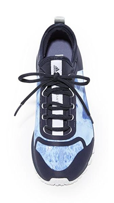 Shop Adidas By Stella Mccartney Adizero Xt Printed Sneakers In Legend Blue/white/purple