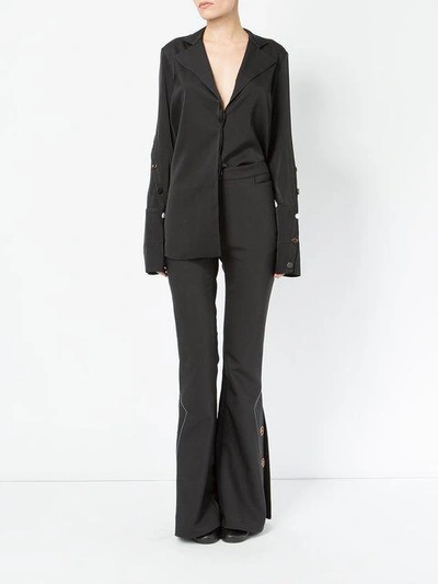 Ellery Flared Button Trousers In Black