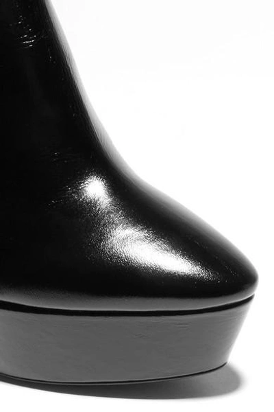 Shop Saint Laurent Vika Leather Platform Ankle Boots In Black