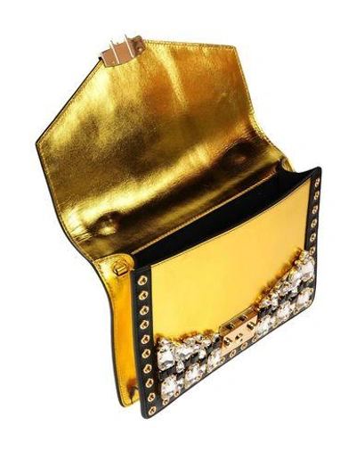 Shop Gedebe Handbags In Gold