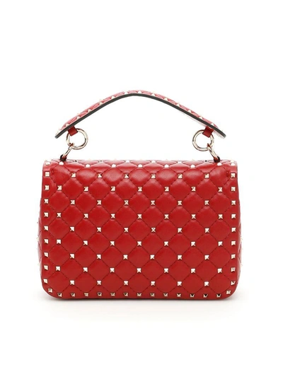 Shop Valentino Medium Spike Rockstud Bag In Rosso|rosso