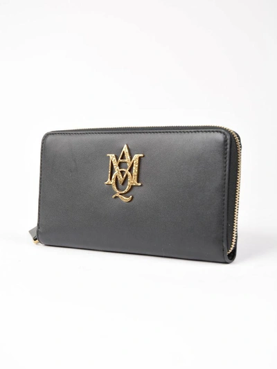 Shop Alexander Mcqueen Insignia Zip Around Wallet In Black
