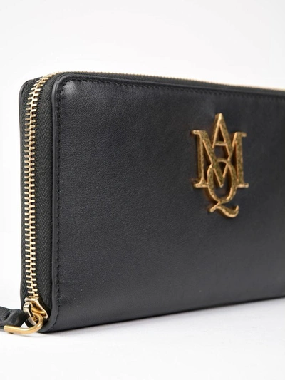 Shop Alexander Mcqueen Insignia Zip Around Wallet In Black