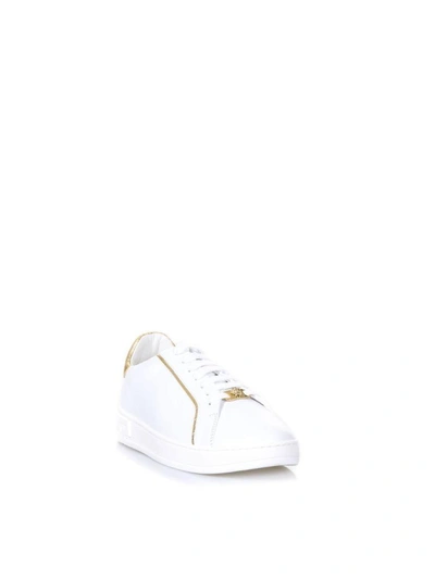 Shop Versace Leather Contrasting Piping Sneakers In White/gold