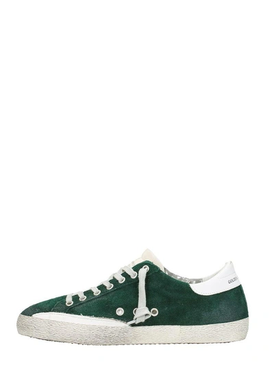 Shop Golden Goose Superstar Green Sneakers