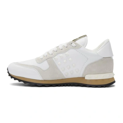 Shop Valentino White  Garavani Rockstud Trainers