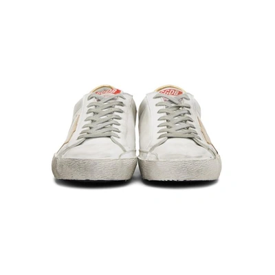 Shop Golden Goose White And Gold Superstar Sneakers In White Leather/gold S