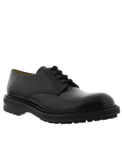 Shop Alexander Mcqueen Laced Up Shoes In Black