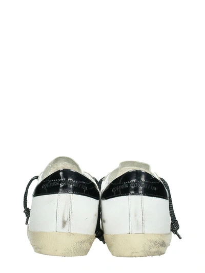 Shop Golden Goose Superstar White Sneakers