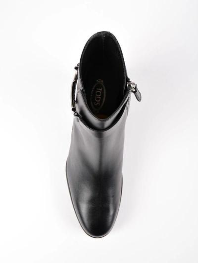 Shop Tod's Front Platform Ankle Boots In Black