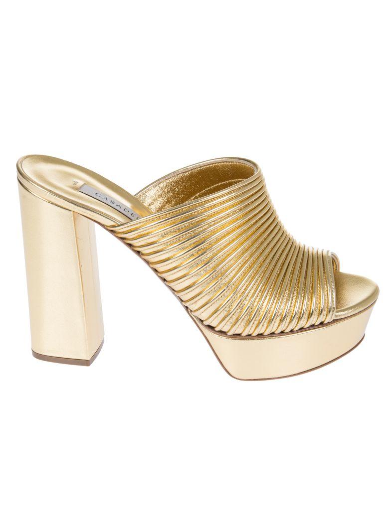 gold platform mules