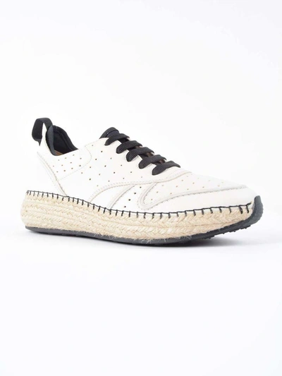 Shop Tod's Raffia Sneakers In White