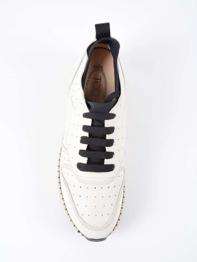 Shop Tod's Raffia Sneakers In White