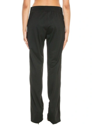 Shop Givenchy Logo Stripes Trousers In Black