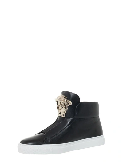 Shop Versace High Top Leather Sneakers In Nero