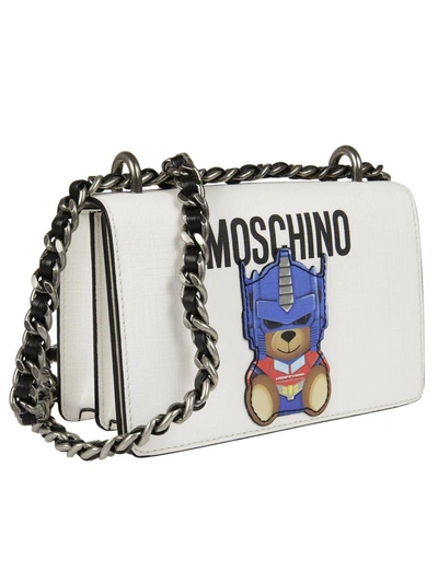 Shop Moschino Transformer Teddy Shoulder Bag In White