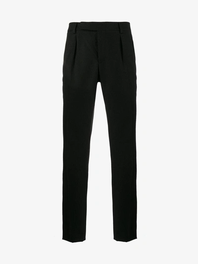 Shop Saint Laurent Double Pleated Tailored Trousers In Black