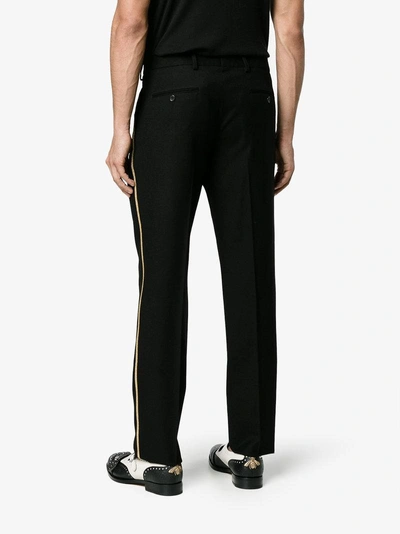 Shop Saint Laurent Double Pleated Tailored Trousers In Black