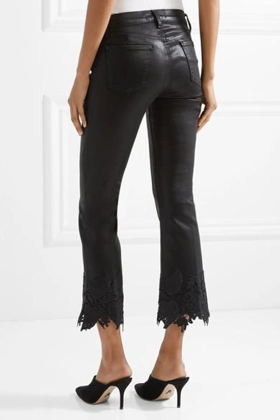 Shop J Brand Selena Lace-trimmed Cropped Coated Mid-rise Flared Jeans In Black