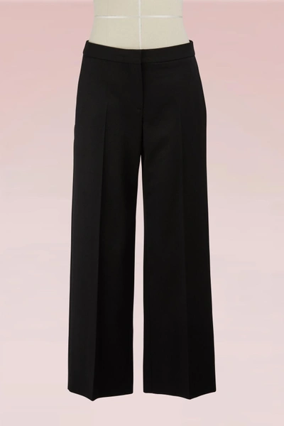 Shop Alexander Mcqueen Cropped Wool Pants In 1000 - Black