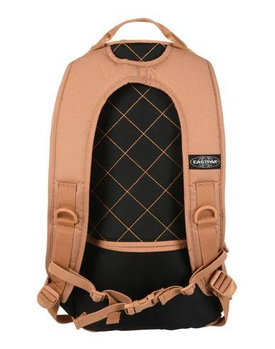 Shop Eastpak Backpacks & Fanny Packs In Brown