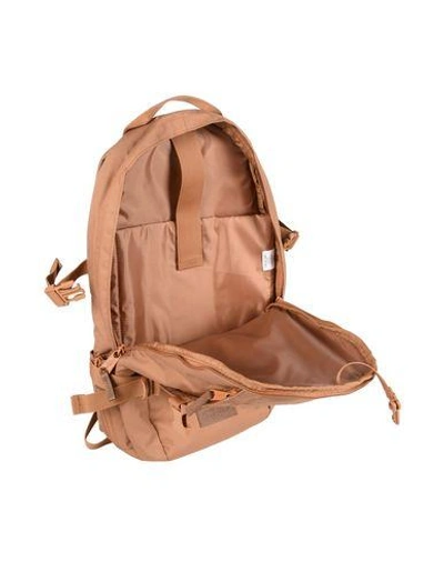 Shop Eastpak Backpacks & Fanny Packs In Brown