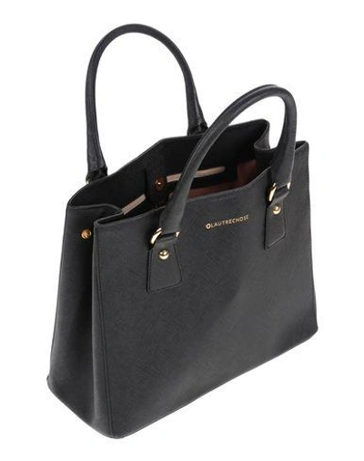 Shop A.w.a.k.e. Handbag In Black