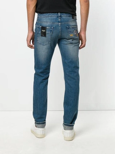 Shop Fendi Stonewashed Jeans With Embroidery In Blue