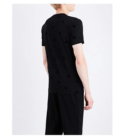 Shop Mcq By Alexander Mcqueen Swallow-flocked Cotton-jersey T-shirt In Darkest Black