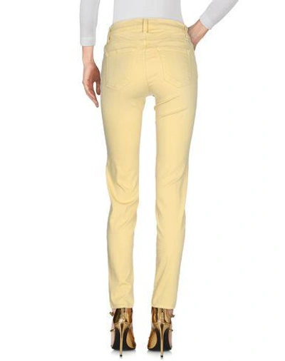 Shop J Brand Denim Pants In Light Yellow