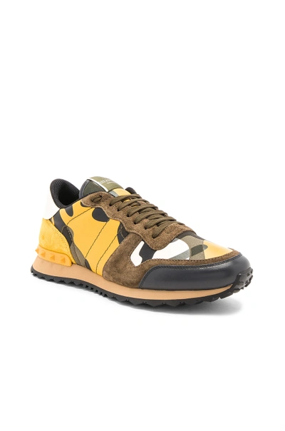 Shop Valentino Rockstud Camouflage Sneakers In Yellow Multi