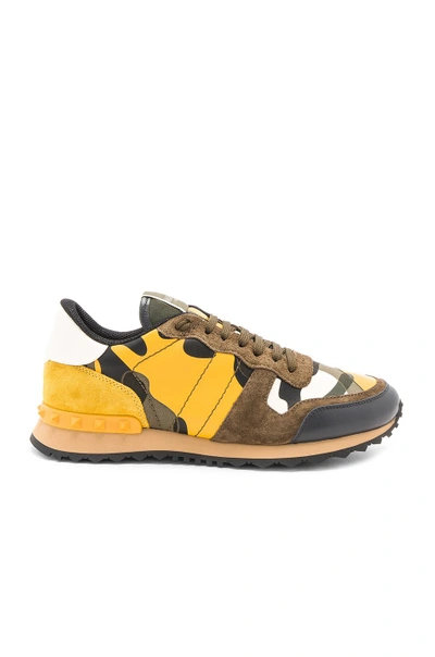 Shop Valentino Rockstud Camouflage Sneakers In Yellow Multi
