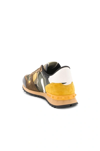 Shop Valentino Rockstud Camouflage Sneakers In Yellow Multi