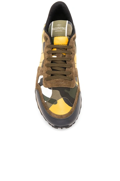 Shop Valentino Rockstud Camouflage Sneakers In Yellow Multi