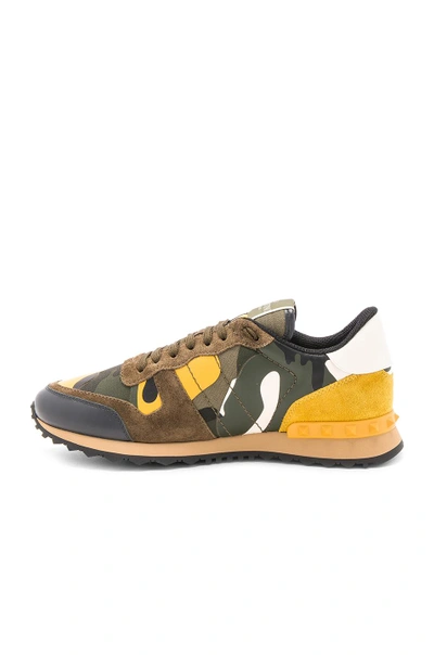 Shop Valentino Rockstud Camouflage Sneakers In Yellow Multi