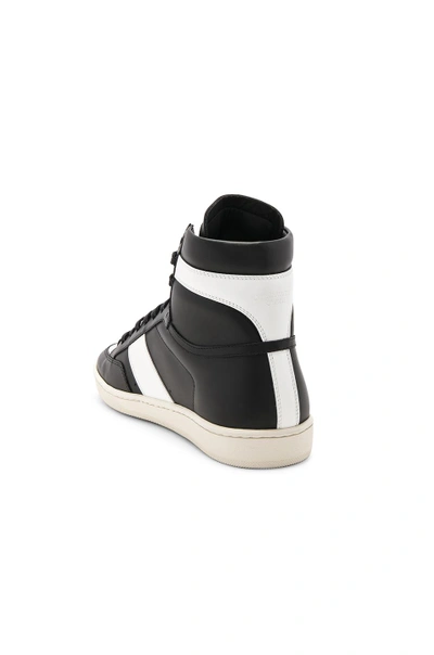 Shop Saint Laurent Signature Court Classic Sl/10h Leather High Top Sneakers In Black & White