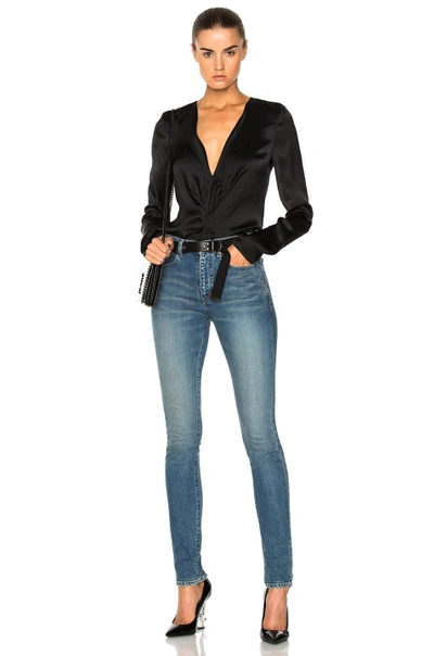 Shop Saint Laurent Medium Rise Jeans In Blue