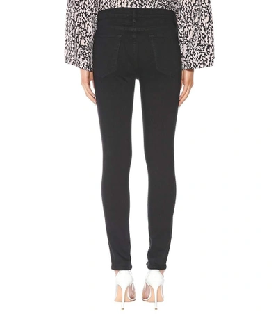 Shop Frame Le High Skinny Jeans In Fieo